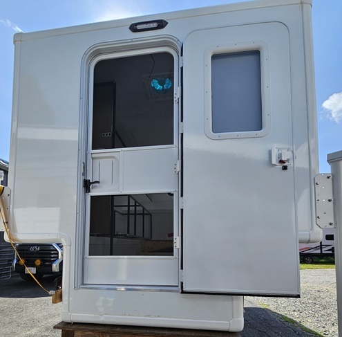 camper rear view of screen door
