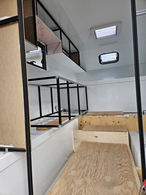 interior view - process of assembly of composite camper, framing